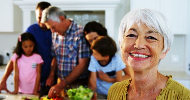 Smiling Elderly Woman Enjoying Family Time in Kitchen - Download Free Stock Images Pikwizard.com