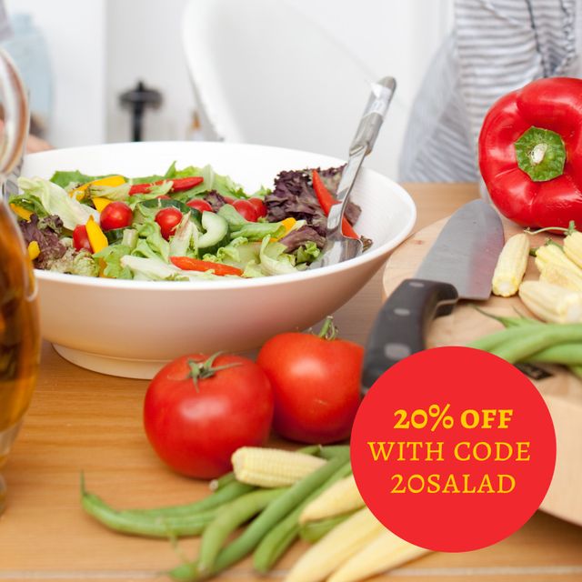 Image showcases a fresh vegetable salad bowl on a table, accompanied by colorful vegetables like red bell pepper, tomatoes, and green beans. A promotional overlay announces a 20% discount using code '20SALAD'. Ideal for use in healthy lifestyle, food promotion, and marketing campaigns, promoting discounts, fresh produce, and healthy eating habits online, on social media, or as part of a digital marketing strategy.