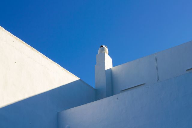 Minimalist White Architecture Against Blue Sky - Download Free Stock Images Pikwizard.com