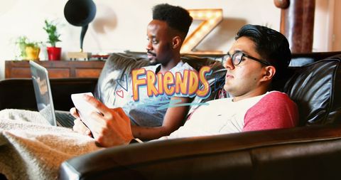 Relaxed Diverse Friends Hanging Out at Home Enjoying Leisure