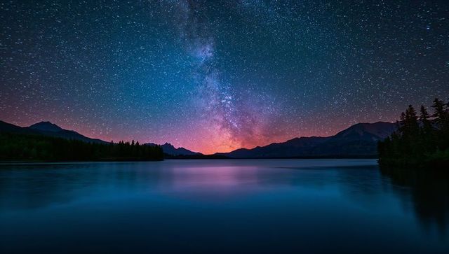 Milky Way Over Tranquil Mountain Lake at Night