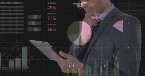 Confident Businessman Using Tablet with Dynamic Data Graphics - Download Free Stock Images Pikwizard.com