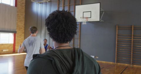 Diverse Basketball Team Training in Indoor Court