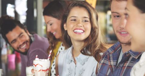 Happy Friends Enjoying Drinks Together