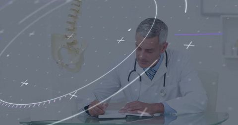 Doctor Writing Patient Notes in Clinical Office