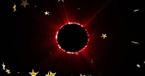 Crimson solar ring with radiant halo and golden star confetti on black background