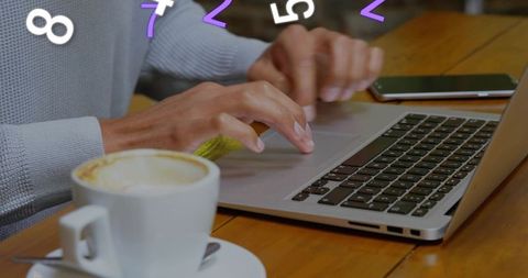 Typing on Laptop at Cafe Table, Freelancer Working Remotely with Coffee Smartphone Nearby