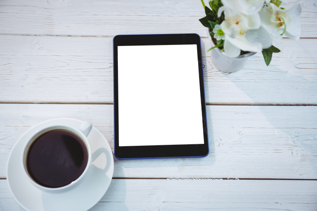 Transparent Tablet Screen with Coffee Cup and Orchid Arrangement - Download Free Stock Videos Pikwizard.com