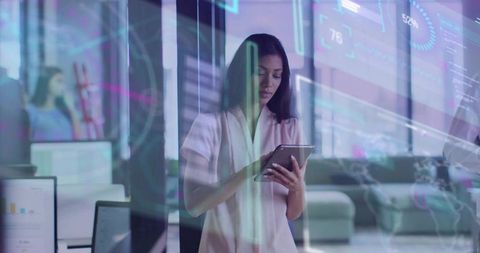 Businesswoman Analyzing Data with Futuristic Digital Overlay in Modern Office