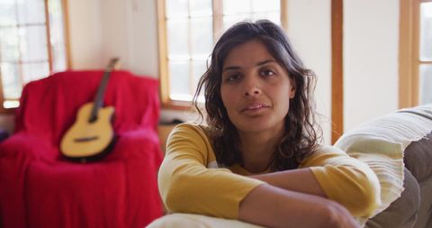 Relaxed Woman in Cozy Home Environment