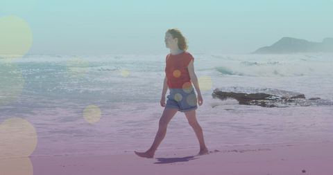 Woman Strolling on Sunny Beach with Colorful Overlays