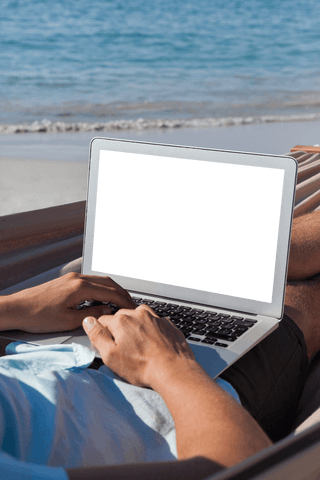 relaxed man with transparent screen laptop on beach hammock - Download Free Stock Videos Pikwizard.com