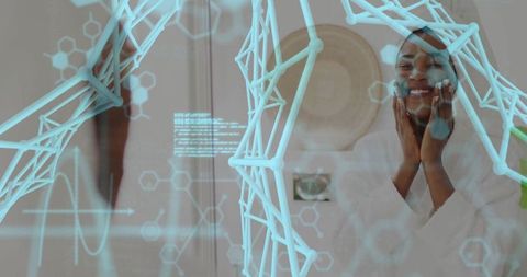 Woman applying facial cream with holographic graphics at home