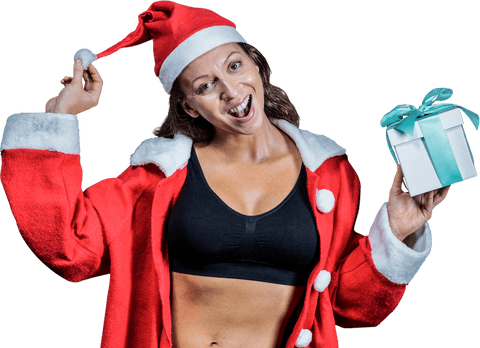 Christmas cheer with fit santa: woman in costume holding present on transparent background