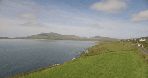 coastal landscape with transparent blue sky and rolling hills - Download Free Stock Videos Pikwizard.com