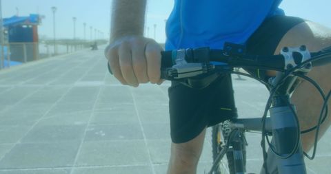 Elderly Man Enjoying Coastal Ride on Sunny Day - Download Free Stock Images Pikwizard.com