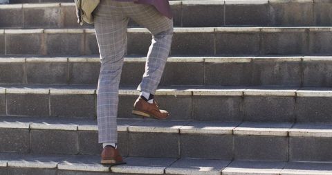 Urban Professional Walking Upstairs with Confidence