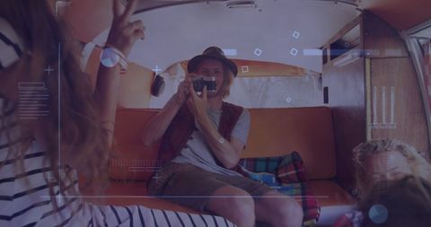 Trendy Group Enjoying Music and Celebration in Van