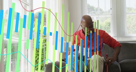 Senior man checking smartphone while holding cane in home with digital data overlay