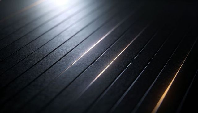 Textured grooved metal panel reflecting warm and cool light, diagonal minimal abstract
