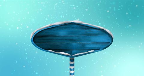 Snow-Covered Wooden Sign with Snowflakes Falling