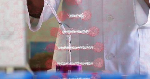 Scientist using pipette for precise laboratory analysis