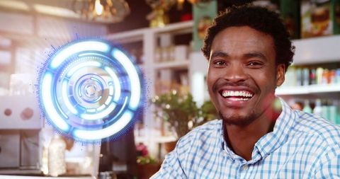 Smiling Man Engaging with Holographic Technology Interface