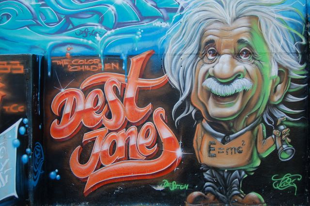 Graffiti Mural of Einstein Character with Whimsical Elements and Text - Download Free Stock Photos Pikwizard.com