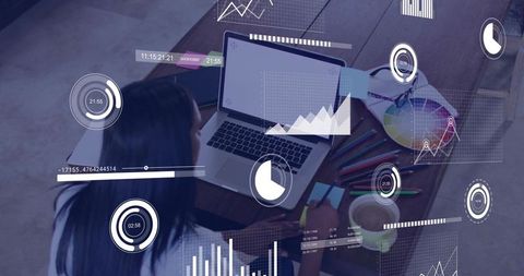 Woman Working on Laptop with Data Analytics Overlays, Remote Productivity Workspace