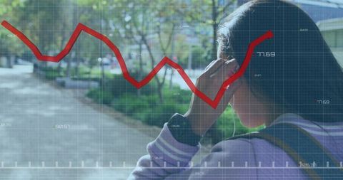 Commuter wearing earbuds walking on campus path with red line data chart overlay