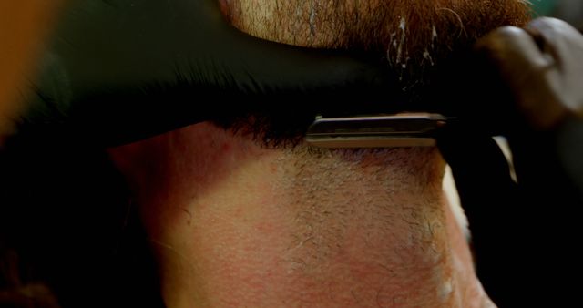 Close-up of Barber Shaving Client's Neck with Straight Razor - Download Free Stock Images Pikwizard.com