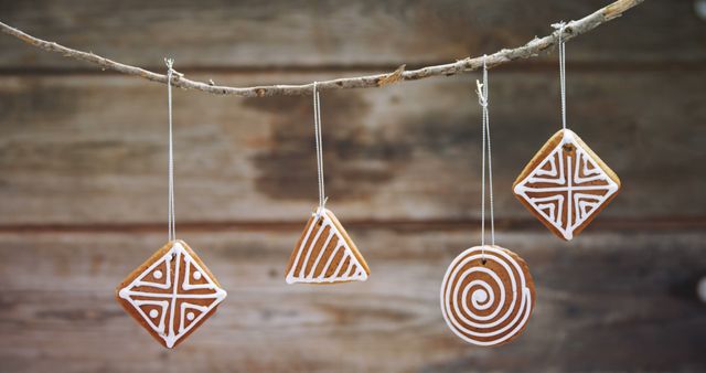 Hand-decorated cookies hanging on rustic string - Download Free Stock Images Pikwizard.com