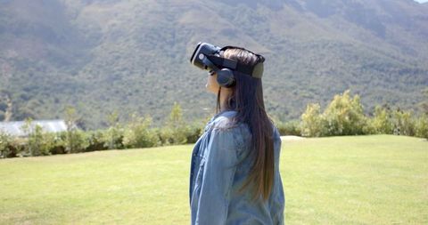 Young Woman Experiencing Virtual Reality in Nature - Download Free Stock Images Pikwizard.com