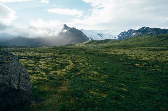 Scenic Mountain Landscape with Lush Green Meadow and Rugged Peaks - Download Free Stock Photos Pikwizard.com