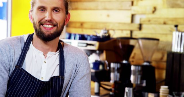 Smiling Male Barista Behind Counter in Coffee Shop - Download Free Stock Images Pikwizard.com