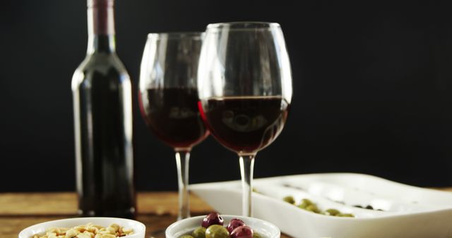 Red Wine with Appetizers on Wooden Table - Download Free Stock Images Pikwizard.com