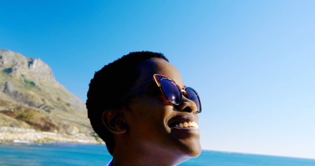 Close-Up Portrait Smiling Person Wearing Sunglasses Enjoying Sunny Day Outdoors - Download Free Stock Images Pikwizard.com