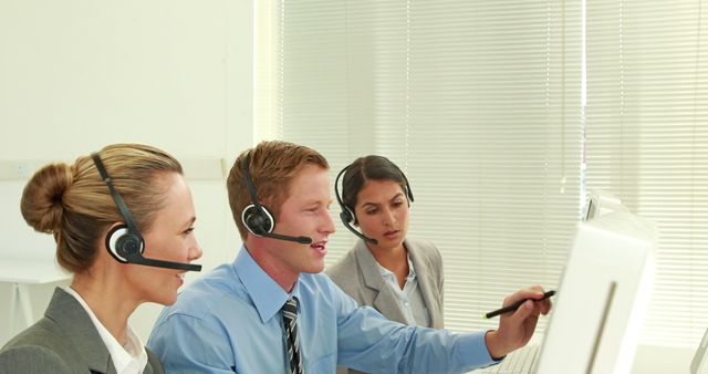 Customer Service Team Collaborating at Workplace - Download Free Stock Photos Pikwizard.com