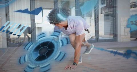 Male athlete preparing for sprint wearing smartwatch with augmented hud on terrace