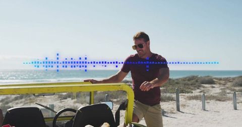 Adventurous man with jeep exploring scenic beachfront
