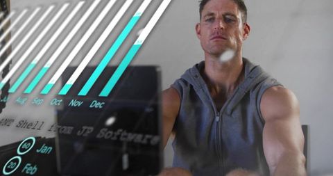 Focused man working from home with teal analytics dashboard and glass reflections