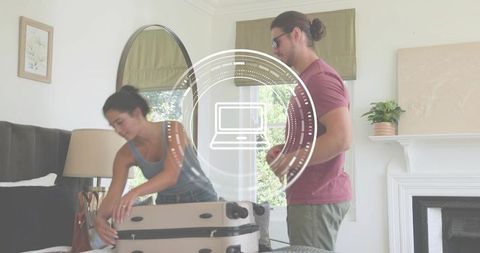 Couple packing suitcase in sunlit bedroom preparing for weekend trip