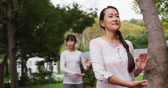 Women Practicing Tai Chi Outdoors in Tranquil Park - Download Free Stock Images Pikwizard.com