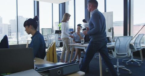Team Collaboration in Modern Workplace Environment with Natural Light - Download Free Stock Images Pikwizard.com