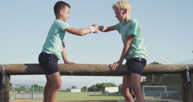 Boys shaking hands on playground structure during summer day - Download Free Stock Images Pikwizard.com