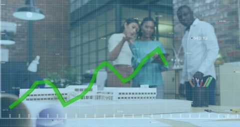 Finance team analyzing market trends in modern office