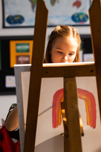 Caucasian Schoolgirl Painting in Elementary Art Class - Download Free Stock Images Pikwizard.com