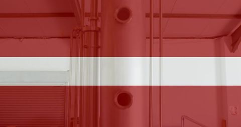 Austrian flag overlaid on industrial factory background