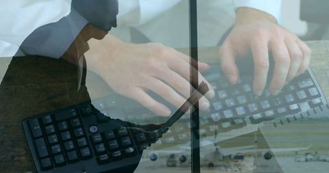 Business Professional Typing on Laptop with Focus on Hands and Technology