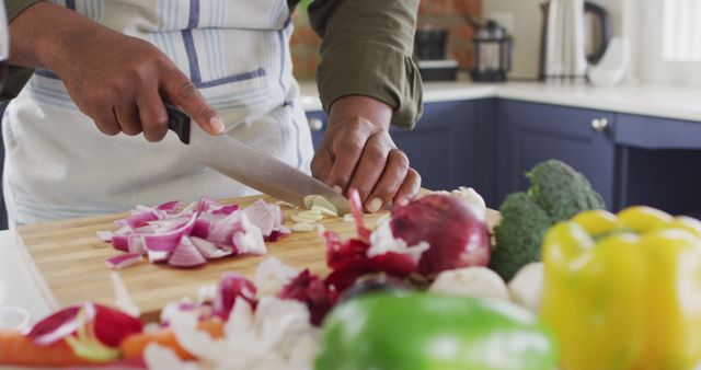 Hands Chopping Vegetables on Cutting Board in Modern Kitchen - Download Free Stock Images Pikwizard.com